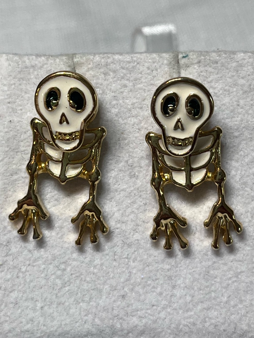 Vintage Gold and White Skeleton Dangle Earrings
Face in front, body is the back